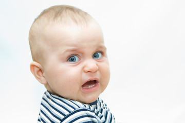 portraits of a baby boy on white background