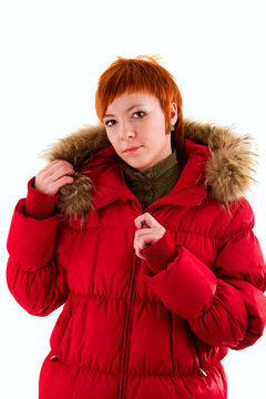 Beautiful redheaded girl on white isolated background