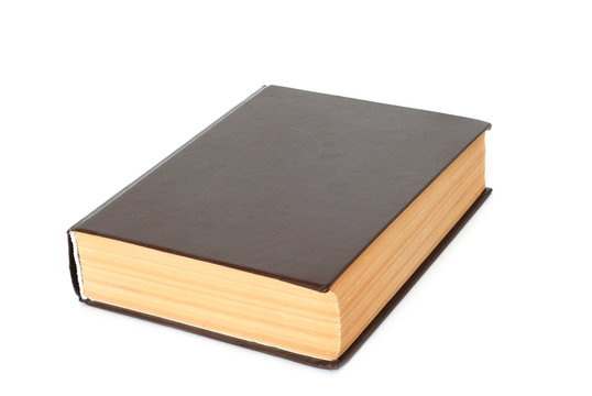 Old brown book isolated on a white background