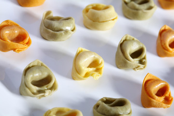 green, natural, red kind of pasta tortellini.