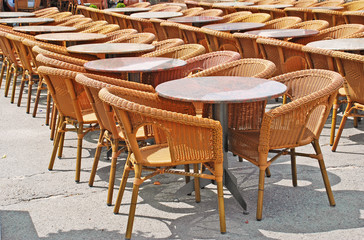 restaurant street terrace with  wicker chairs