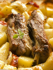 grilled pork ribs with potato close up shoot