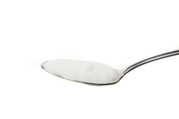 Spoonfull of sugar isoolated on white