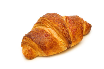 one fresh croissant on white background