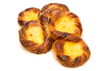 three sweet rolls on white background