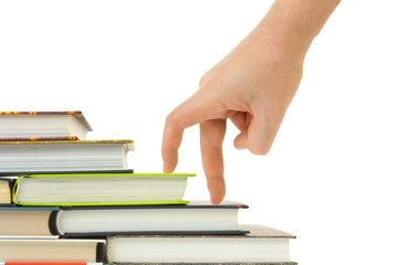 Hand and book stairs isolated on white background
