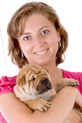 girl with Shar Pei baby dog, almost one month old