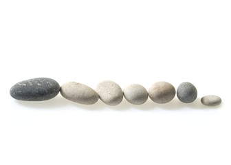 Fototapeta na wymiar Pebbles isolated on a white background