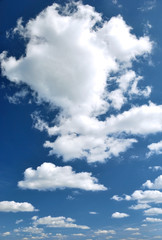 Obraz na płótnie Canvas day blue sky with white fluffy clouds