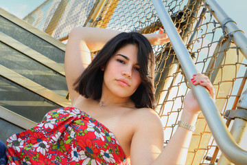 Fototapeta premium Woman posing on a staricase