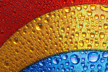 blue gold and red colors abstract water drops , shallow DOF