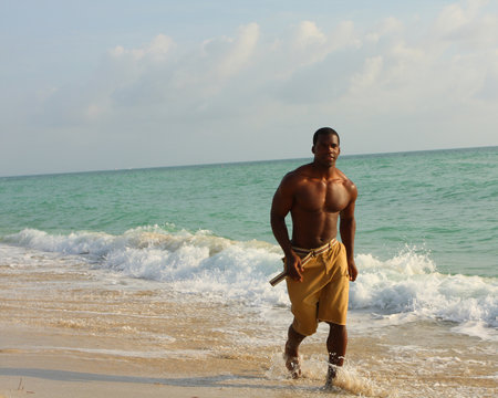 Athletic Man On The Beach