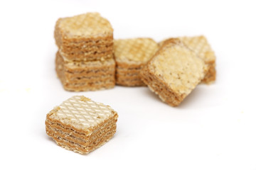 A cappuccino cream filled wafer cubes isolated from others.