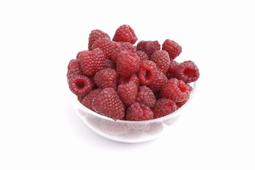 raspberries in glass pot