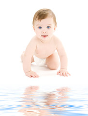 bright picture of crawling baby boy in diaper
