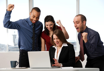 group of business people at an office desk