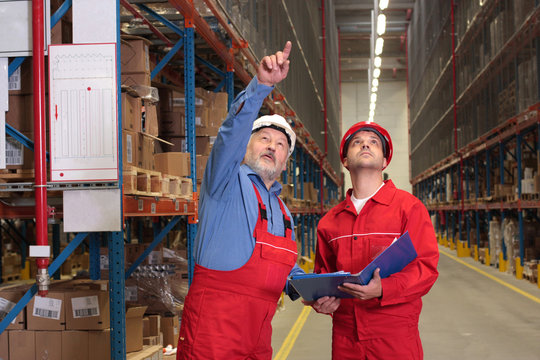 two inspectors in warehouse