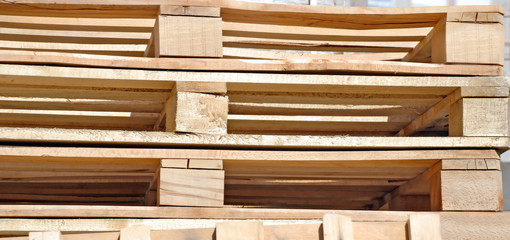 cargo wooden new pallets in pile outdoor