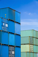 Fototapeta premium shipping cargo containers stacked at freight terminal