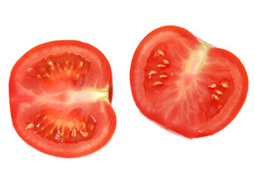 cut tomato. A ripe vegetable with drops of dew..