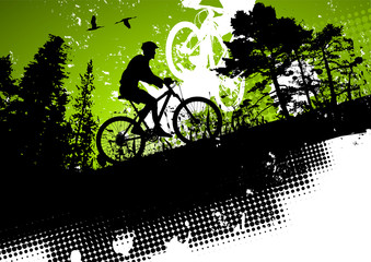 Fototapeta na wymiar Mountain bike in a forest abstract background
