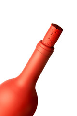 Red wine bottle cilose-up isolated over white background