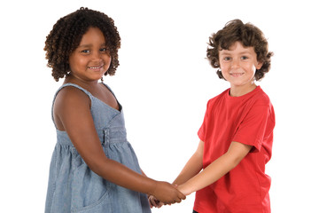 two handsome children of different races. Heir hands together