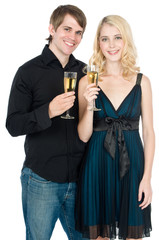 An attractive young couple drinking champagne together
