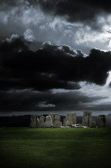A dramatic stormy sky over stonehenge in Wiltshire
