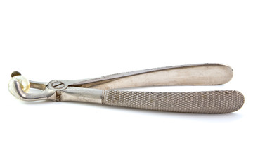 Dental pliers with glass ball isolated on white background