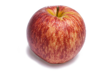 Vibrant red apple isolated on white background