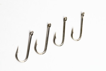 fishing hooks macro close up on white