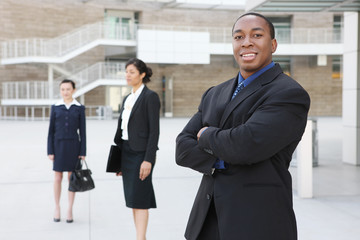 Fototapeta premium Handsome african american business man with team