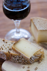 A french tasty slice of cheese on a piece of bread with cereals