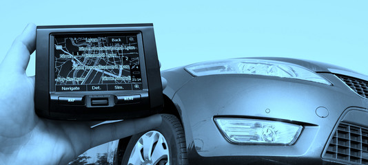 GPS Vehicle navigation system in a man hand