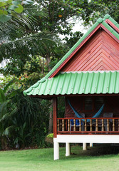 Rustic beach bungalow in Thailand - travel and tourism.