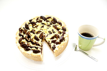Pflaumenkuchen und Kaffee