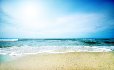 Fototapeta na wymiar Clean beach under blue sky