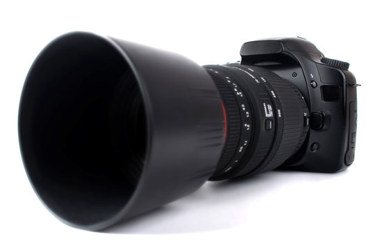 Dslr camera with zoom lens, isolated on white
