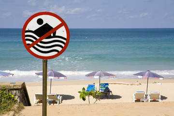 No swimming sign at a beach.