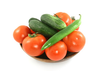 fresh vegetable in dish isolated on white