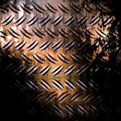 Worn metal plate with some damage on it