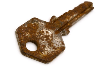 rusty key on white background
