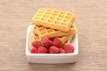 delicious waffles with fresh raspberries - food and drink