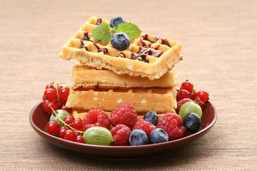 delicious waffles with fresh raspberries - food and drink