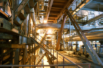 Pipes, tubes, machinery and steam turbine at a power plant