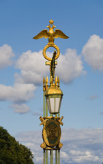 Fototapeta na wymiar The decorative gilt lantern in St.-Petersburg, Russia