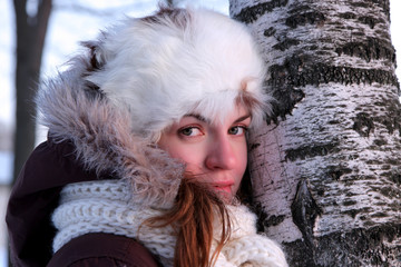 A portrait of young woman in winter outwear