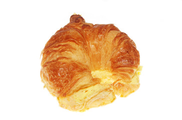 Buttered croissant isolated on white