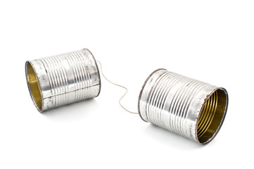 two tins connected together by string to make phone